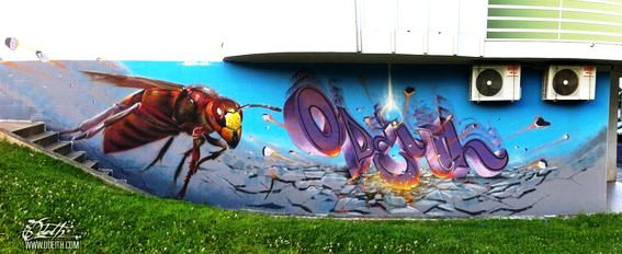 Killer-bee-and-falling-letters-Graffiti-Mural-Odeith-Damaia-Portugal